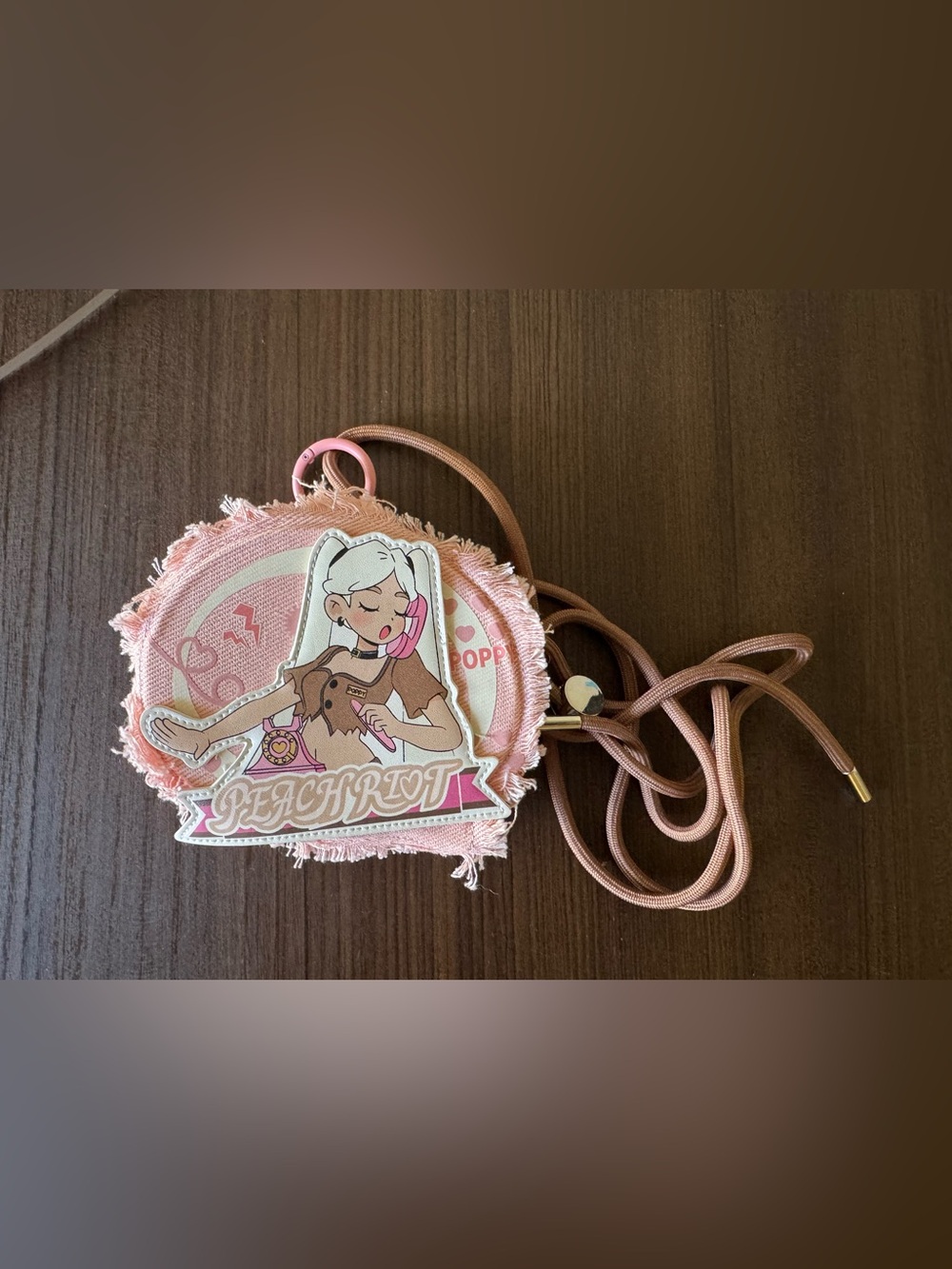 Peach Riot Pink Graphic Round Crossbody Bag